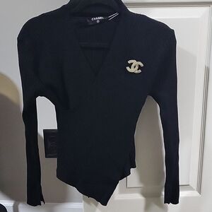 CHANEL Black V-Neck Sweater with Gold and Crystal Emblem